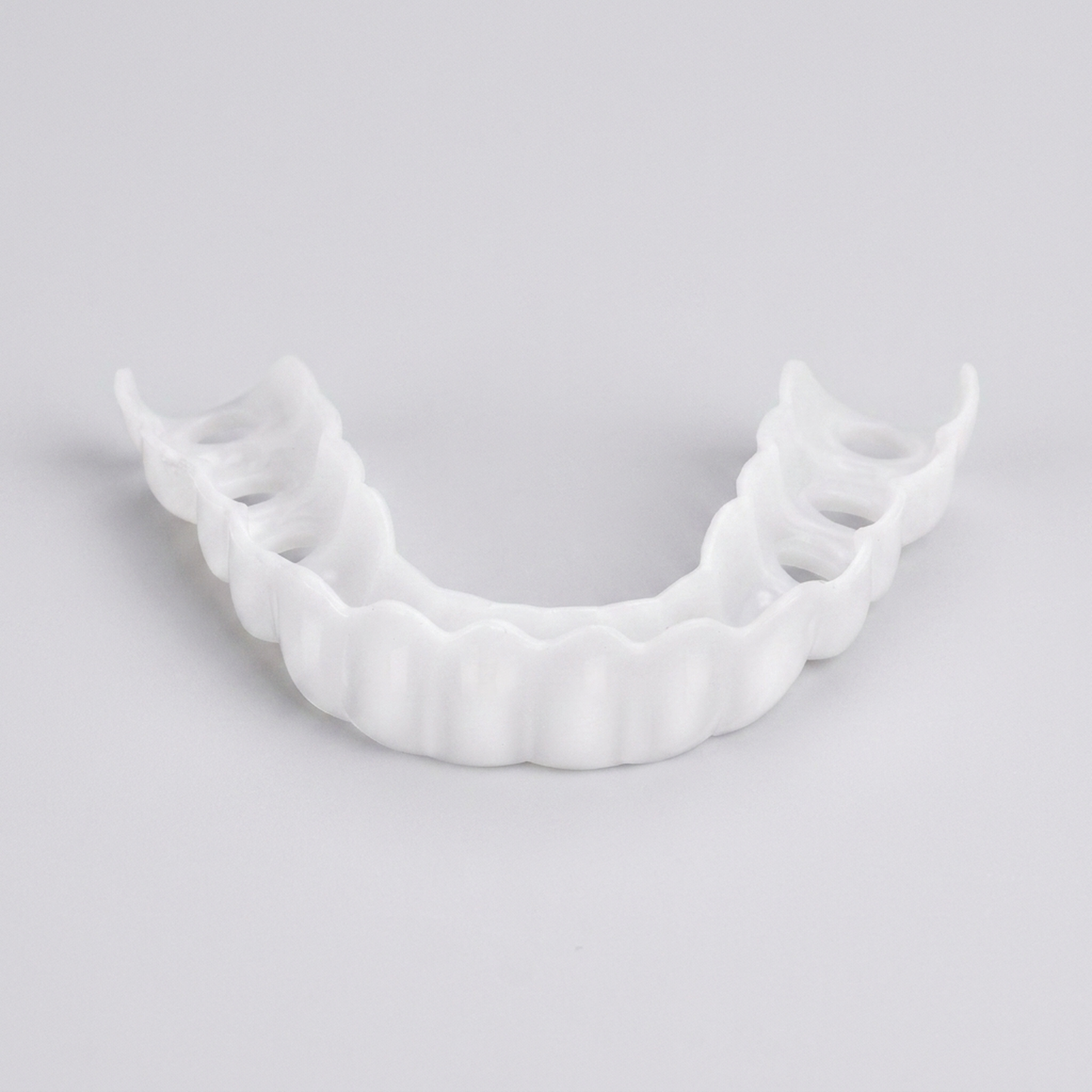 LISTINGOPT::kovosis::adjustable-snap-on-dentures-for-a-confident-smile::04-closeup