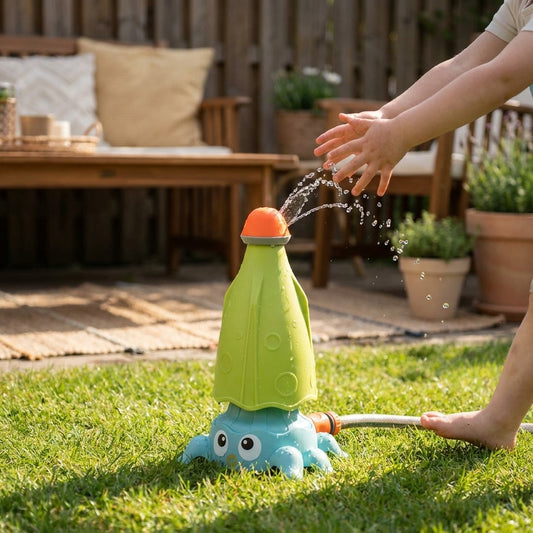 LISTINGOPT::kovosis::outdoor-water-spray-sprinkler-for-kids-and-toddlers-backyard-spinning-rocket-sprinkler-toy-water-toys-for-toddlers-boys-girls::02-inuse
