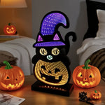 Luci a zucca 3D con gatto nero per un bagliore spettrale