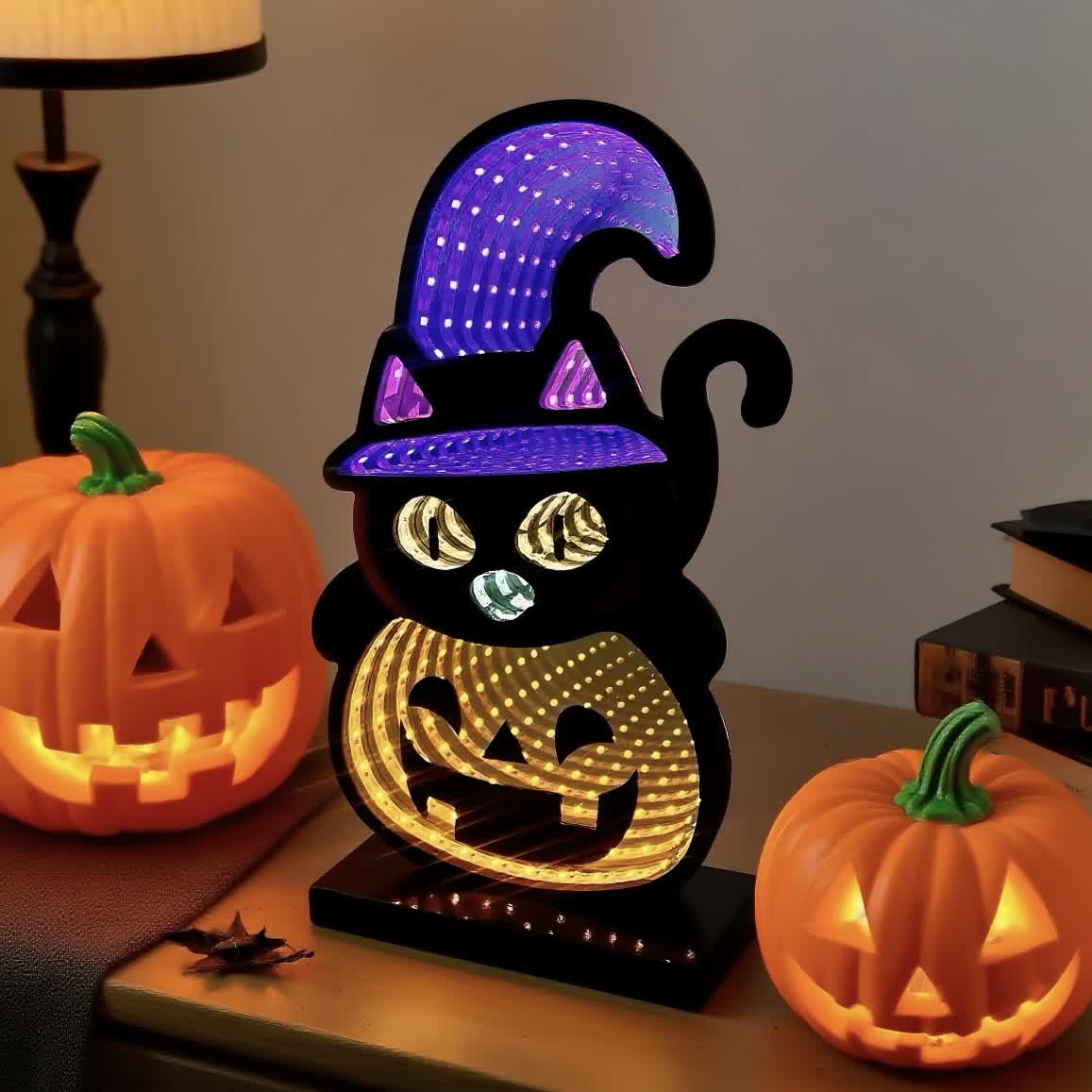 Luci a zucca 3D con gatto nero per un bagliore spettrale