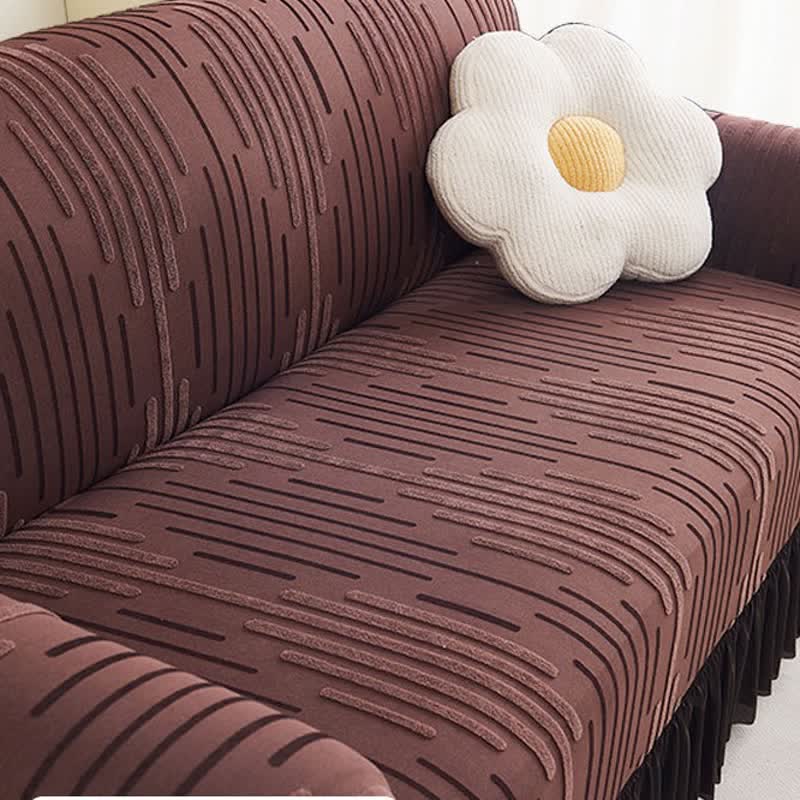 Copertura per divano jacquard con volant per una protezione elegante