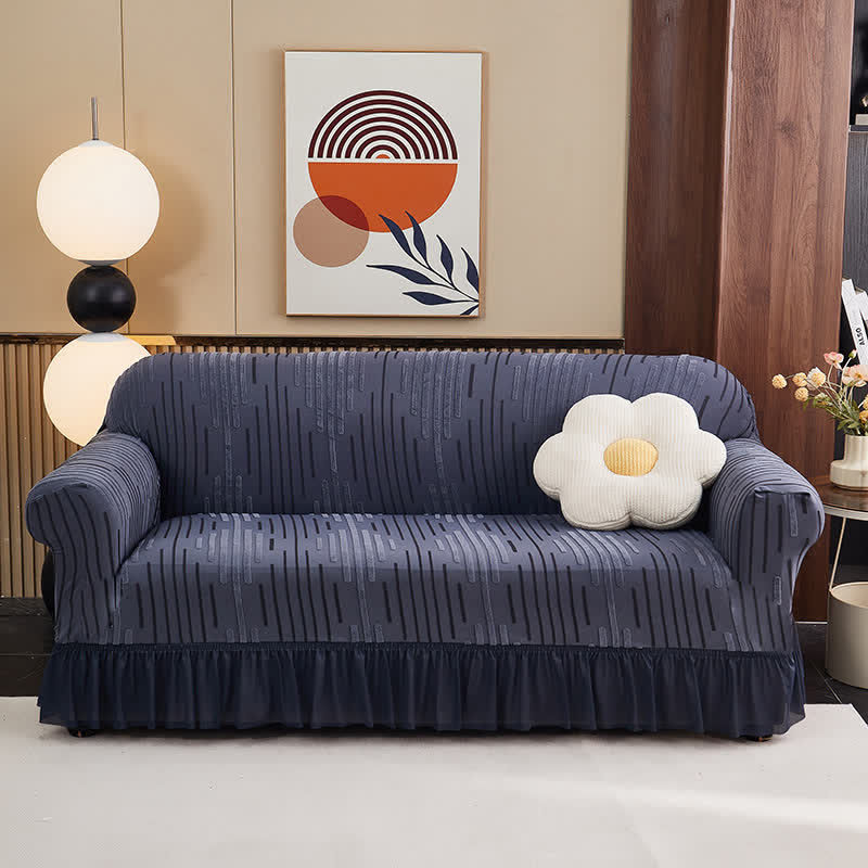 Copertura per divano jacquard con volant per una protezione elegante