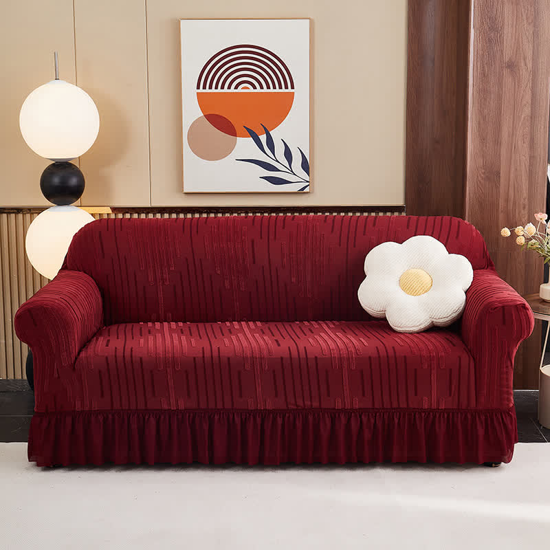 Copertura per divano jacquard con volant per una protezione elegante