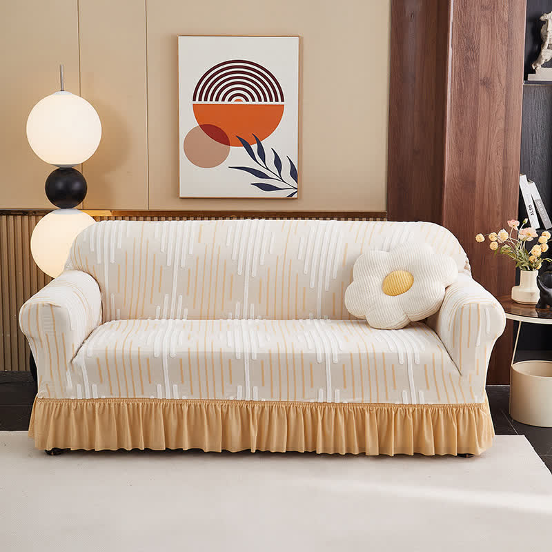 Copertura per divano jacquard con volant per una protezione elegante