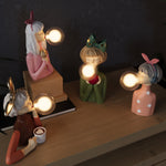 Figürliche Tischlampe mit künstlerischem Charakter