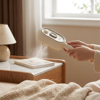 LISTINGOPT::kovosis::3-in-1-electric-spray-air-cushion-massage-comb::02-inuse