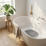 LISTINGOPT::kovosis::bathroom-mat-anti-slip-sucker-round-pvc-bath-mat-with-drain-hole-silicone-bathing-rugs-foot-massage-pad-bathtub-soft-shower-mat::03-lifestyle