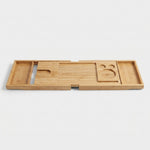 LISTINGOPT::kovosis::bathtub-caddy-tray-bamboo-spa-bathtub-caddy-organizer-book-wine-tablet-holder-reading-rack-nonslip-bottom-extendable-sides::04-closeup