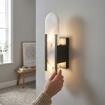 LISTINGOPT::kovosis::oval-marble-wall-sconce-for-a-serene-glow::02-inuse