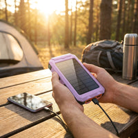 LISTINGOPT::kovosis::portable-solar-mobile-phone-charger-camping-external-battery-charger-for-mobile-phones-2-usb-led-flashlights-with-compass-for-outdoor-activities-20000mah40000mah-portable-solar-power-bank::02-inuse