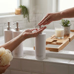 LISTINGOPT::kovosis::round-dispenser-bundle-shampoo-conditioner-and-body-soap::02-inuse