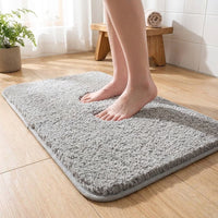 LISTINGOPT::kovosis::softhaven-plush-microfiber-bath-mat-for-comfort-safety::02-inuse