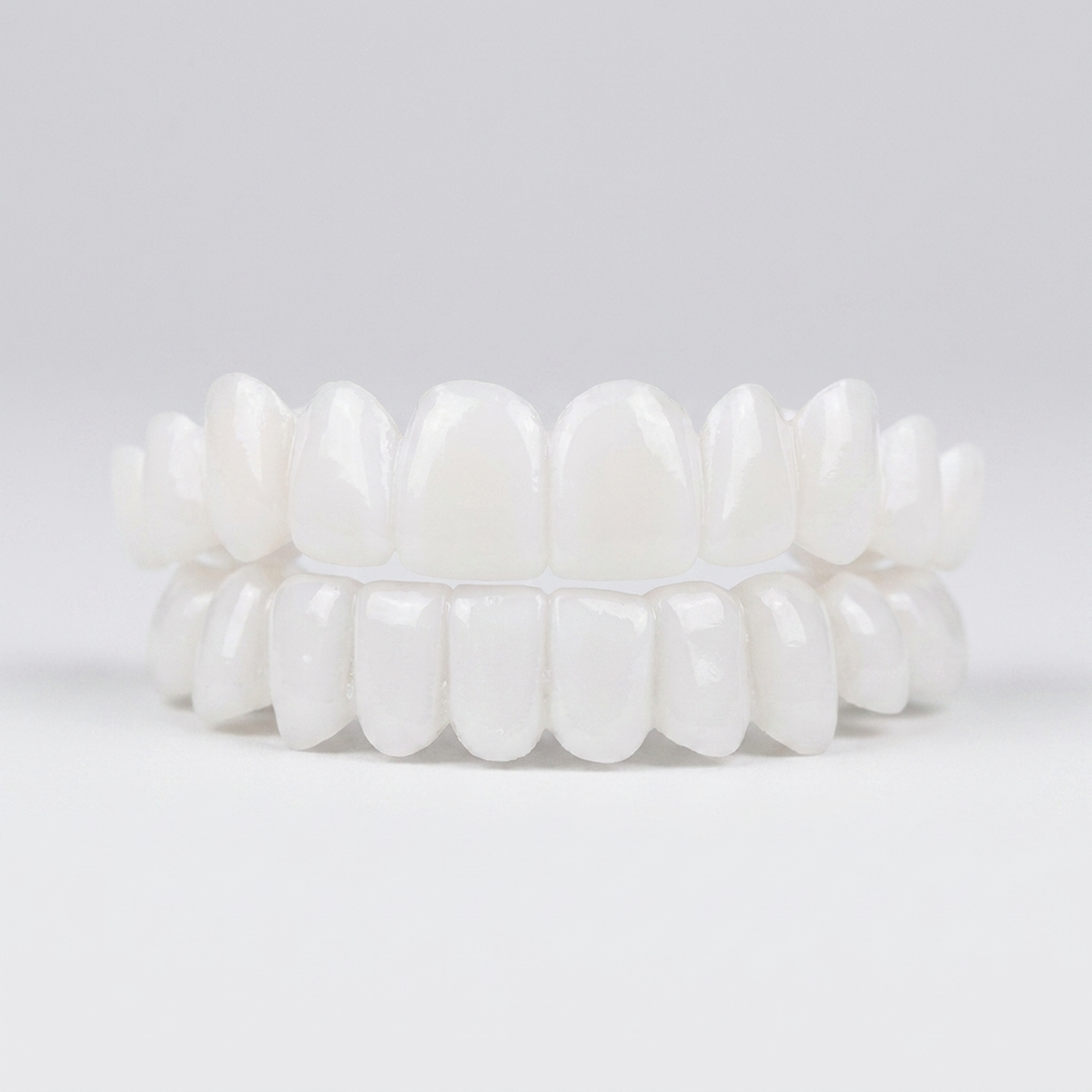 LISTINGOPT::kovosis::white-dental-lens-denture-for-a-confident-smile::04-closeup