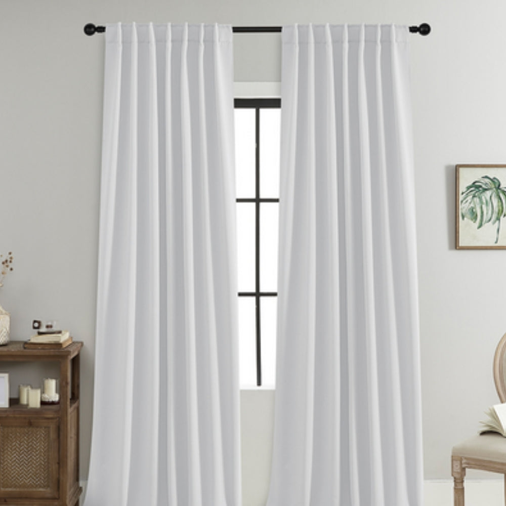 Cortinas opacas Noiréa para ambiente de descanso