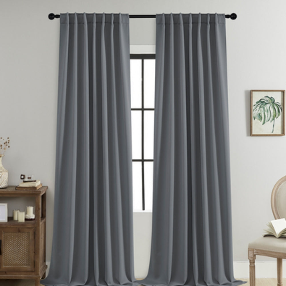 Cortinas opacas Noiréa para ambiente de descanso