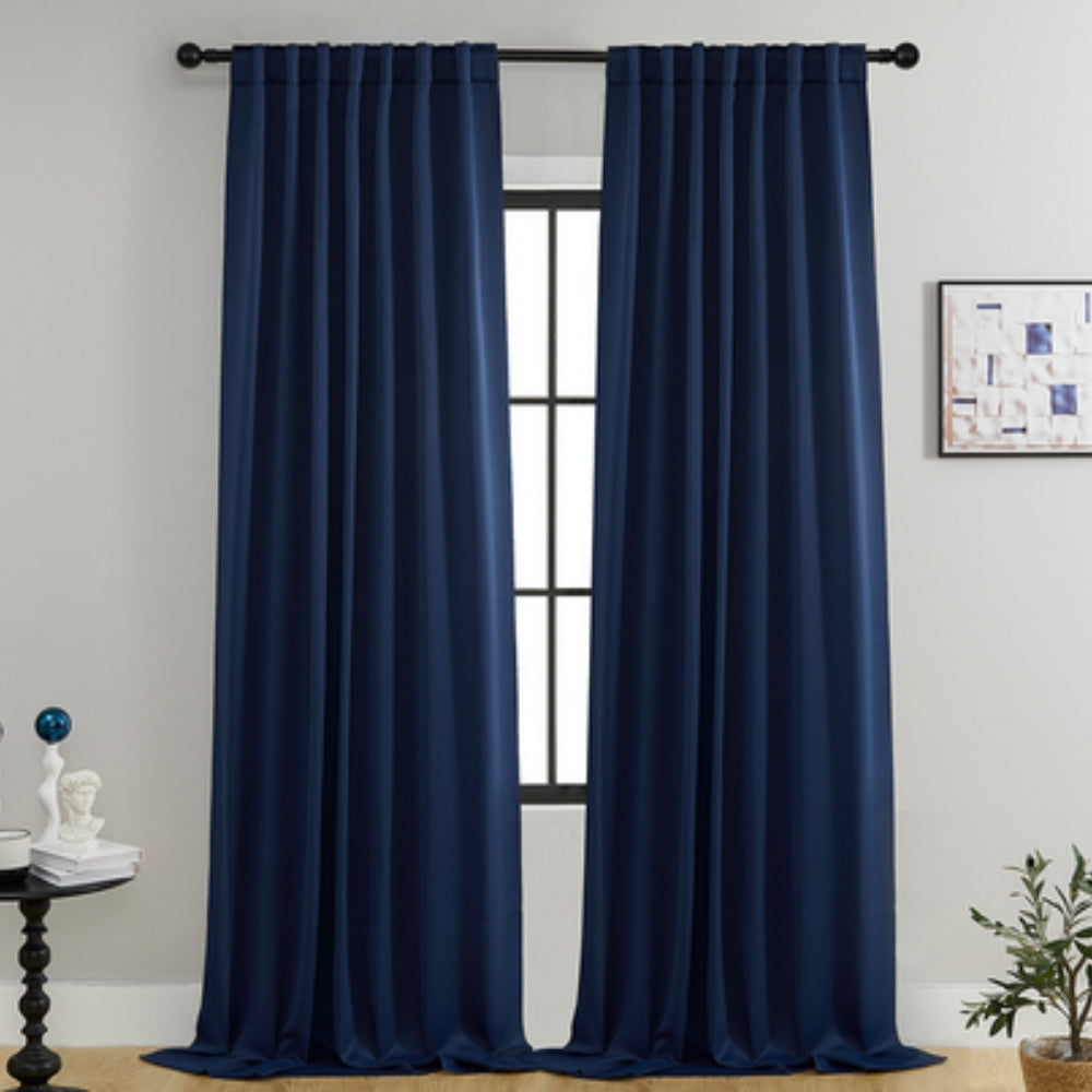 Cortinas opacas Noiréa para ambiente de descanso