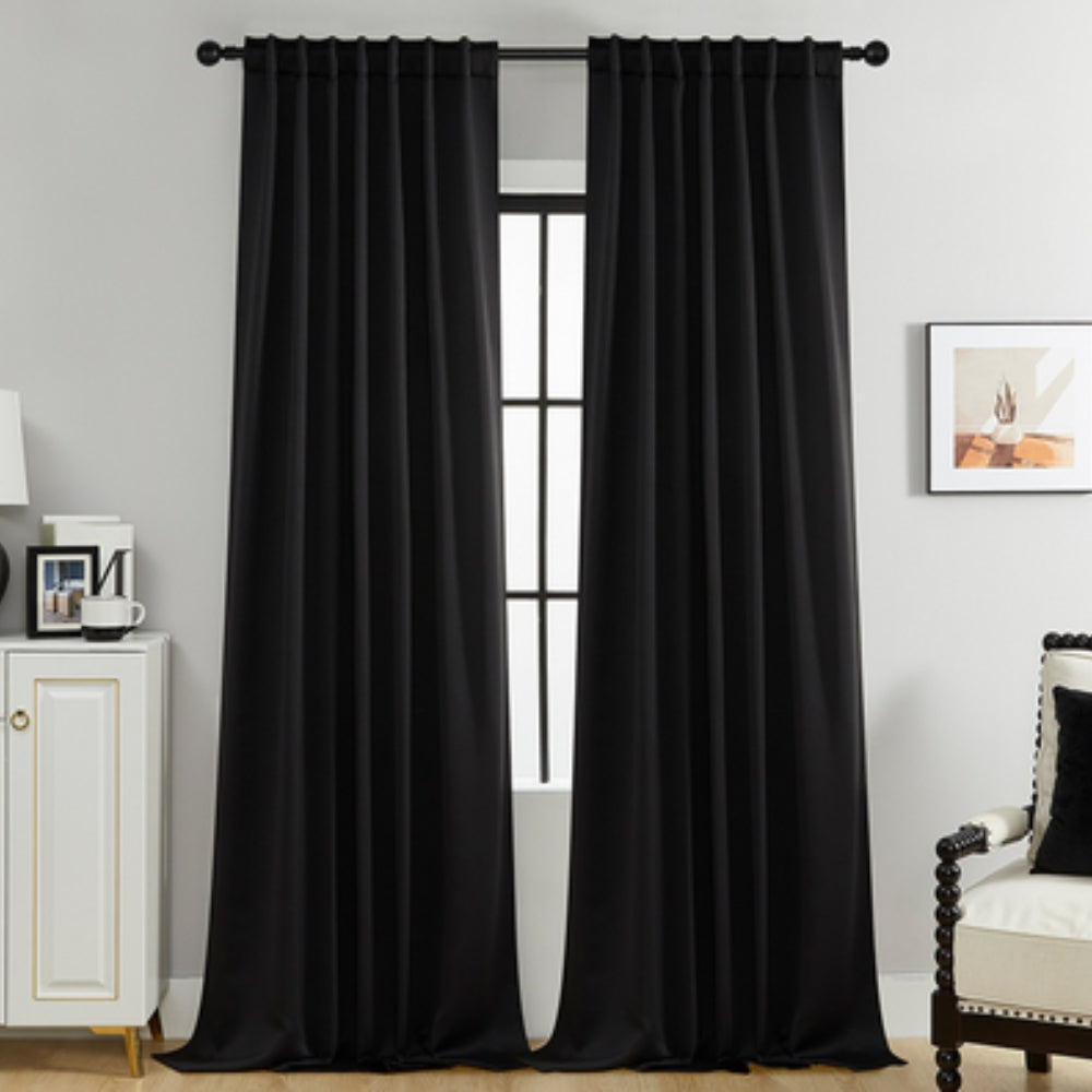 Cortinas opacas Noiréa para ambiente de descanso