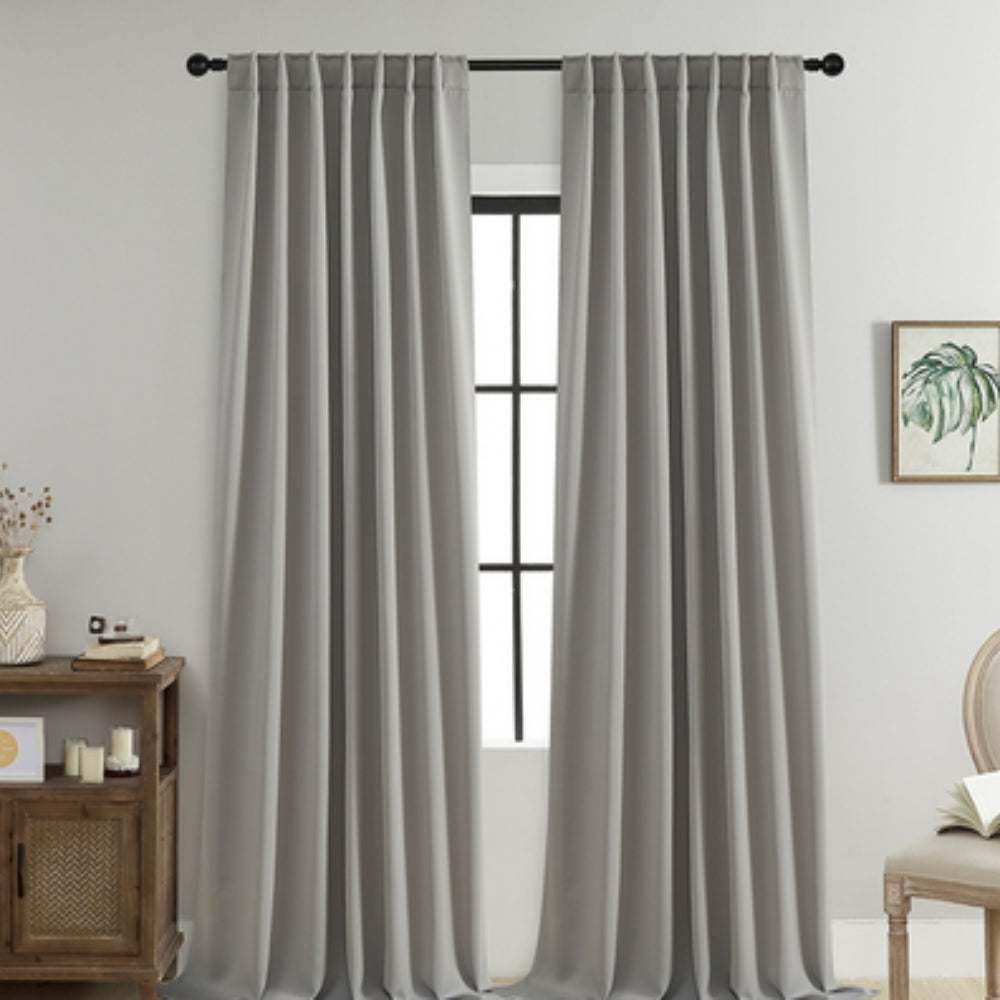 Cortinas opacas Noiréa para ambiente de descanso