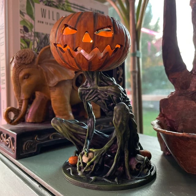 Glowing Pumpkin Figure For Eerie Halloween Charm